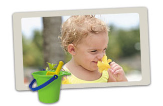 toddler on beach holiday